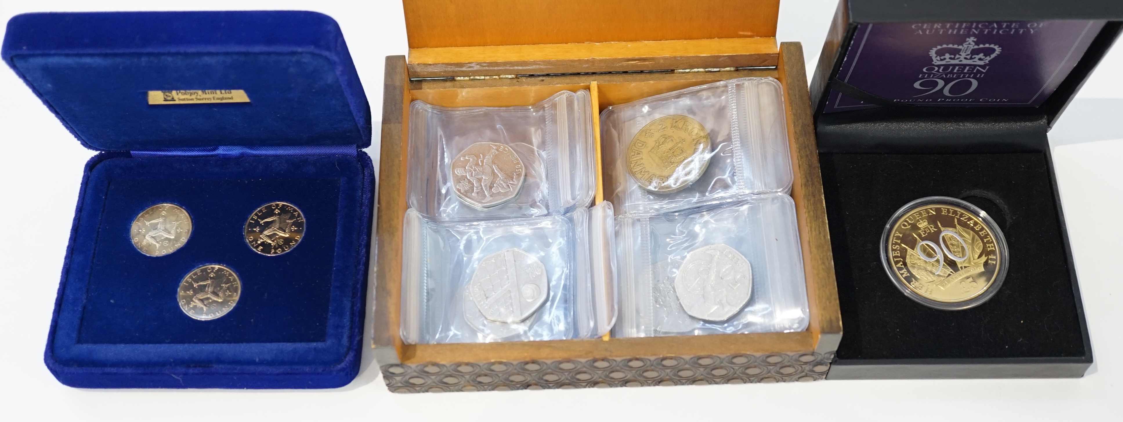 British coins, 1953 coronation coin and commemorative stamp set issued by Jubilee Mint, George V First World War maundy silver threepence set, issued by Bradford Exchange, a Bailiwick of Jersey £5, 2016 and Isle of Man o